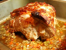 Finished roast pork in tray Finished roast pork in tray